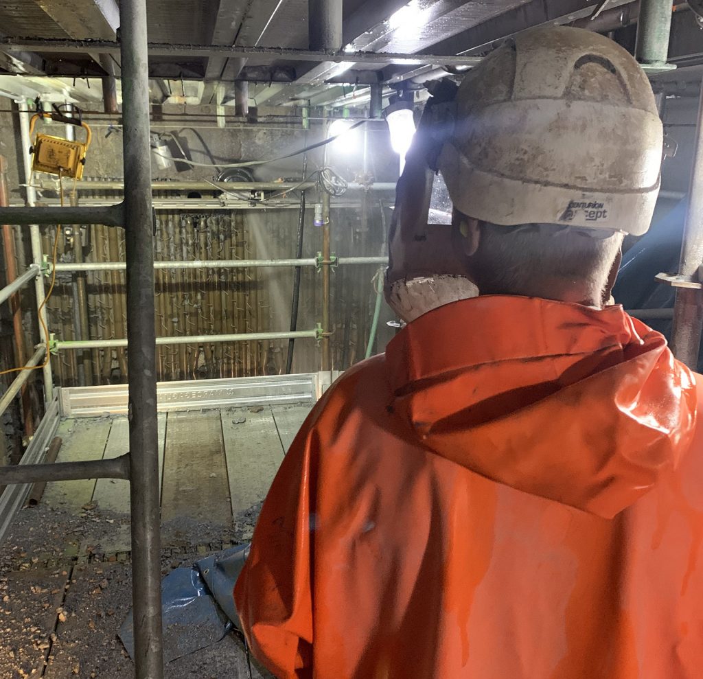 Operator wearing their Hydro Demolition PPE at a safe operating distance 